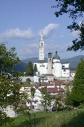 Multiple church towers in Enego