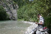 Lunch along Italian Alps river