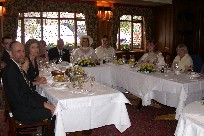 Wedding couple oversee celebration dinner