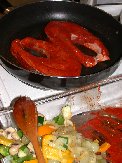 Achiote Salmon being lightly browned -vegetables to be added (3 meals worth)