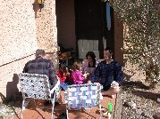 Everyone gathers on the front walk for some winter sun