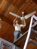 Paul ducks as he spins blades on new ceiling fan