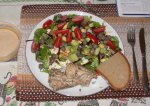 Canned mackerel accompanied by garbonzo salad and rye bread