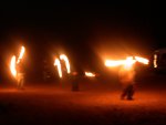 3 fire dancers light up the area