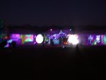 Wide view of black lighting and video circular screens