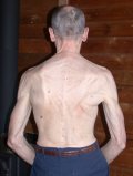 That's quite a set of back muscles for a 70 year old purposely calorie restricted man