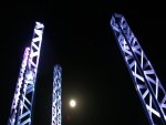 Moon framed in silver towers