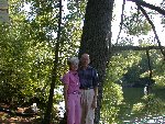 Kitty & Paul at base of the biggest tree on our property