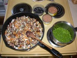 In preparation - Heavily mushroomed tuna with green peas
