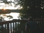 Paul takes final siting as the sun sets before marking the deck railing