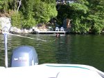 Peter slowly brings the boat forward to straighten the tow line