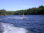 Much of narrower east end of lake can be seen behind Paul during a slight loop in the southward turn